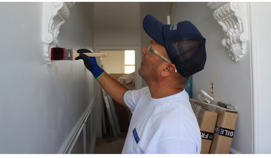 painter doing interior paint job